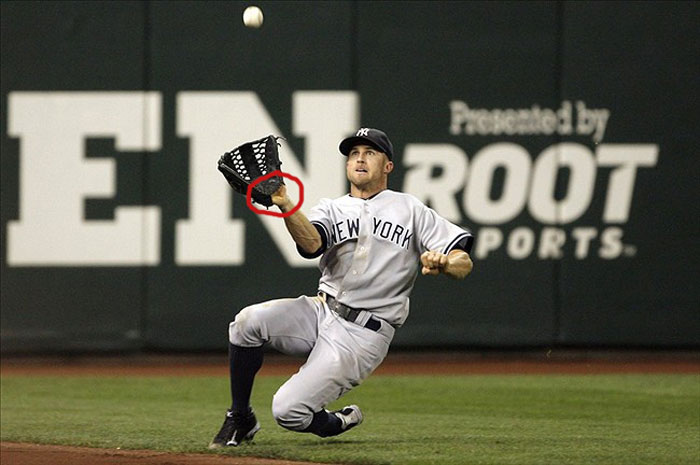 Yankees' left fielder Brett Gardner showing palm